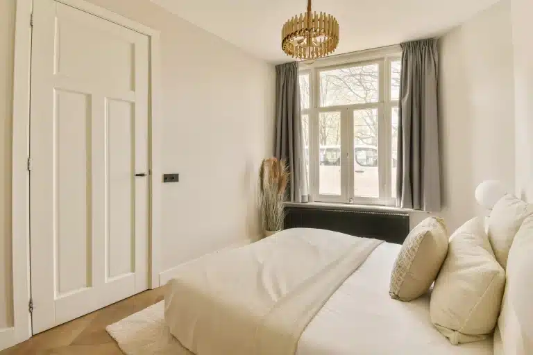 white bedroom with traditional wall panels